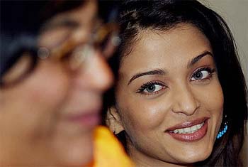 Bollywood star Aishwarya Rai smiles as Indian-born British filmmaker Gurinder Chadha speaks during a Press conference