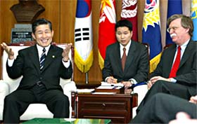 US Undersecretary of State, John Bolton talks to South Korean Defence Minister Lee Jun 
