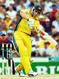 Australia�s Adam Gilchrist hits a boundary in the first one-day final against England in Sydney