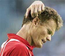 Wayne Ferreira of South Africa reacts after missing a point