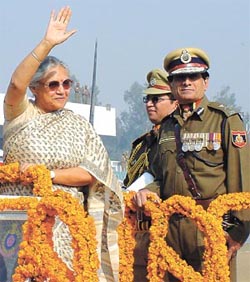 Delhi Chief Minister Sheila Dikshit taking guard of honour