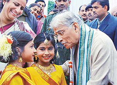 The Union Human Resource Development Minister, Mr Murli Manohar Joshi, being greeted by two girls 