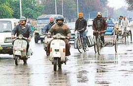 Rain catches commuters unawares in Chandigarh