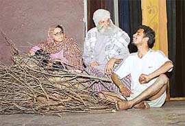 Artistes perform in "Natak Munshi Khan Da" being staged at Tagore Theatre, Sector 18, Chandigarh