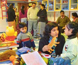 Tiny tots being entertained with toys at The Gurukul as their parents wait for their turn of informal interaction for admission to the pre-nursery class