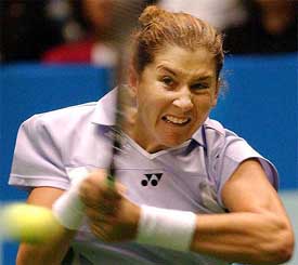 Monica Seles of the USA returns a ball in her match against Ai Sugiyama of Japan 