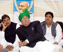 The President of the Indian National Lok Dal and Haryana Chief Minister, Mr Om Prakash Chautala, along with his sons Ajay and Abhey, sitting on collective fast against an article entitled 'Maxim’s kick-ass work-out' published in Maxim