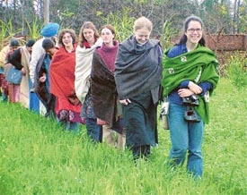 Visitors from Michigan State University enjoy in the fields at Barsal village 