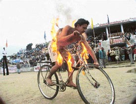 Balbir, a youth from Hoshiarpur, displays his skills at Kila Raipur games