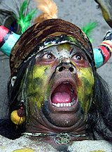 A tribal dancer performs a traditional dance