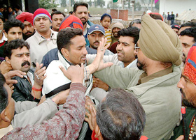 Policemen try to save a cop