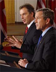 President George W. Bush and British Prime Minister Tony Blair address the media