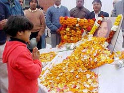 A child pays homage to Kalpana Chawla in Karnal on Sunday.