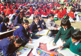 Schoolchildren participate in �Komal Jeevan� painting competition organised by the LIC