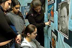 Students from Kiriat Motzkin high school arrange a display on Sunday in memory of Ilan Ramon