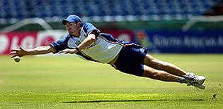 England's James Anderson dives for a catch during a practice session at the St George�s cricket ground in Port Elizabeth 