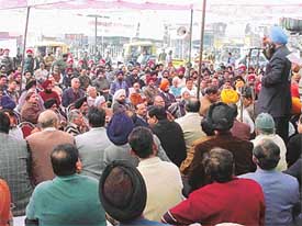 An industrialist addresses a rally against the introduction of Exim form