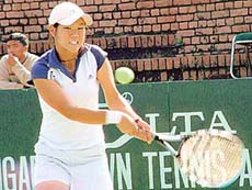 Tangpong Montinee of Thailand displays her prowess against Arutyunova Elina of Uzbekistan to enter the third round of the ITF Junior Ranking Tennis Tournament being played here at the CLTA courts, Sector 10, on Wednesday.