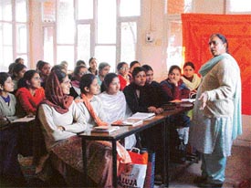 Mr S.P. Sidhu talks to students at a seminar on fashion designing in Guru Nanak Girls College in Ludhiana