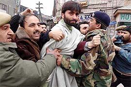 The police detains JKLF chairman Mohammad Yaseen Malik after party activists defied the prohibitory orders