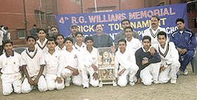 The Frank Anthony School team, which won the R G Williams Cricket Tournament, with the winners� trophy.
