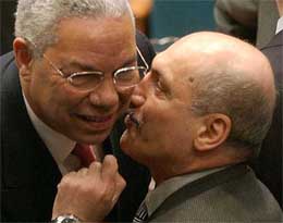 US Secretary of State Colin Powell talks with Kuwaiti Ambassador to the UN