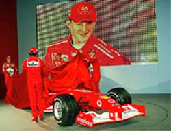 Formula One World Champion Michael Schumacher of Germany is seen on a large screen
