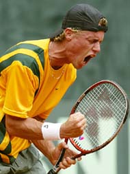 Australia's Lleyton Hewitt yells as he celebrates a point during his singles match against Britain's Alex Bogdanovic 