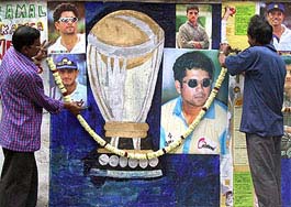 As the World Cup fever mounts up, Indian cricket enthusiasts set-up a garland on a wall 