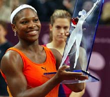 Serena Williams of the USA holds the trophy