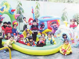 Tiny-tots of Lovely Lotus school play with new games at the end of school interviews