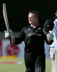 New Zealand's Scott Styris celebrates after scoring his first one-day century 
