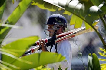 India captain Saurav Ganguly carries his bats to a training session 