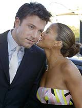 Actor Ben Affleck, star of the new action film "Daredevil," listens to his fianc�e