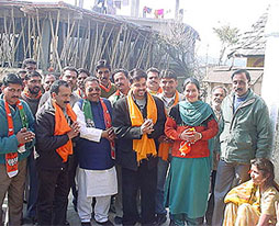 Anurag Thakur, the eldest son of Chief Minister Prem Kumar Dhumal, accompanied by Vinod Thakur, state general secretary, BJYM, campaign for BJP nominee