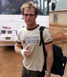 South African cricketer Jonty Rhodes prepares to board the team bus 