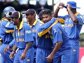 Sri Lanka fast bowler Chaminda Vaas celebrates after dismissing a Bangladeshi batsman