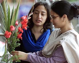 Pakistani women choose flowers on Valentine's Day in Islamabad 