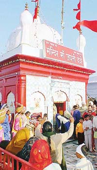Hundreds of devotees offer prayers on the first day of the annual fair at the ancient Mata Jayanti Devi temple situated near Chandigarh
