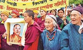 Members of the Himalayan Committee for Action on Tibet and India Tibet Friendship Society march for world peace 