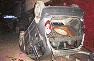 The damaged car, allegedly belonging to Satish Naggar, one of the accused in Saturday�s violence at the Civil Hospital