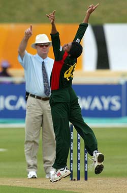 Bangladeshi bowler Hoque Ehsanul celebrates