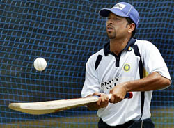India's Sachin Tendulkar tests his bat during a practice session