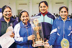 Eves of the RSB, Chandigarh, are all smiles after winning the table tennis title in the All-India Civil Services competitions in Chandigarh