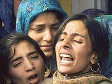 Relatives mourn the death of Rashid in an IED blast in Baramula on Thursday.