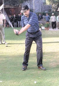 Kapil Dev takes a swing at the CanSupport Golf Tournament 