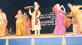 Artistes from Mathura present a special choreographic sequence, "Barsana ki holi", during Kala Gram Utsav, in Chandigarh, on Sunday.