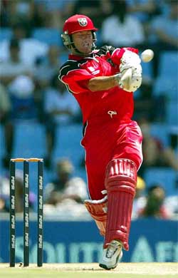 Canadian batsman John Davison pulls the ball for a six