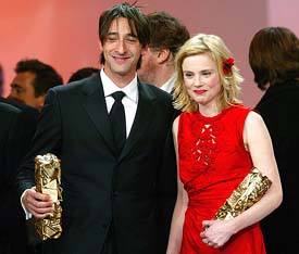 US actor Adrien Brody and French actress Isabelle Carre hold the best actor and best actress awards 