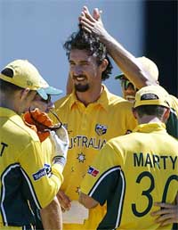 Australia's Jason Gillespie celebrates with team-mates after dismissing Zimbabwe's Guy Whittall 